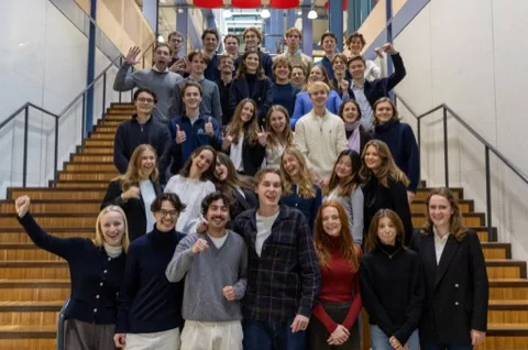 LSE German Society committee team on the LSE atrium stairs.